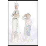 A vintage Lladro figurine titled " Walk With the Dog " and numbered 4893. This 15" tall figure