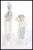 A vintage Lladro figurine titled " Walk With the Dog " and numbered 4893. This 15" tall figure