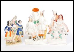 A group of three 19th century Victorian large Staffordshire flatback figures to include Robin Hood