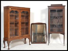 An Edwardian upright pedestal china display cabinet together with a 1930's walnut Queen Anne revival
