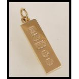 A hallmarked 9ct gold ingot pendant. Hallmarked London 1976. Total weight approx 31.3g.