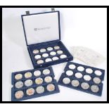 A cased collection of 36 x .999 Silver Eagle Westminster collectors Coins within capsules,