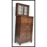A Jaycee / Old Charm jacobean revival drinks / cocktail display cabinet. The hinged top with