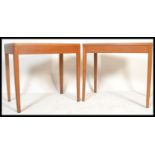 A pair of mid century Air Ministry marked office desks - writing tables in golden oak being raised