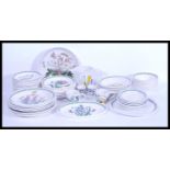 A collection of Portmeirion botanic garden table wares, to include water jug, tray, pie dish, two