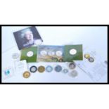 A collection of legaltender and silver proof coins, fourteen in total, all in capsules apart from