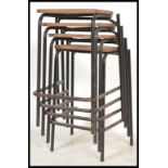 A set of 4  retro 20th century stacking school / Industrial laboratory stools. The black metal