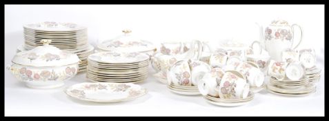 A vintage 20th Century extensive dinner and tea service by Wedgwood consisting of plates, cups,