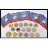 A collection of 17 Commemorative coins to include silver proof examples, coins to include crowns,