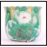 A 19th century Victorian majolica planter in the manner of George Jones having blue glaze interior