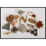 A collection of Vintage brooches to include singed Original by Robert, Les Barnard, Freirich, Art,