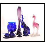 A selection of Bristol blue glass ornaments to include a large blue glass goblet marked for the