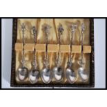 A set of six early 20th Century Italian silver coffee / tea spoons having figural handles comprising