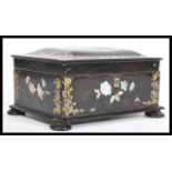 An early 20th Century Chinese lacquer box in the manner of Jennens and Bettridge being decorated