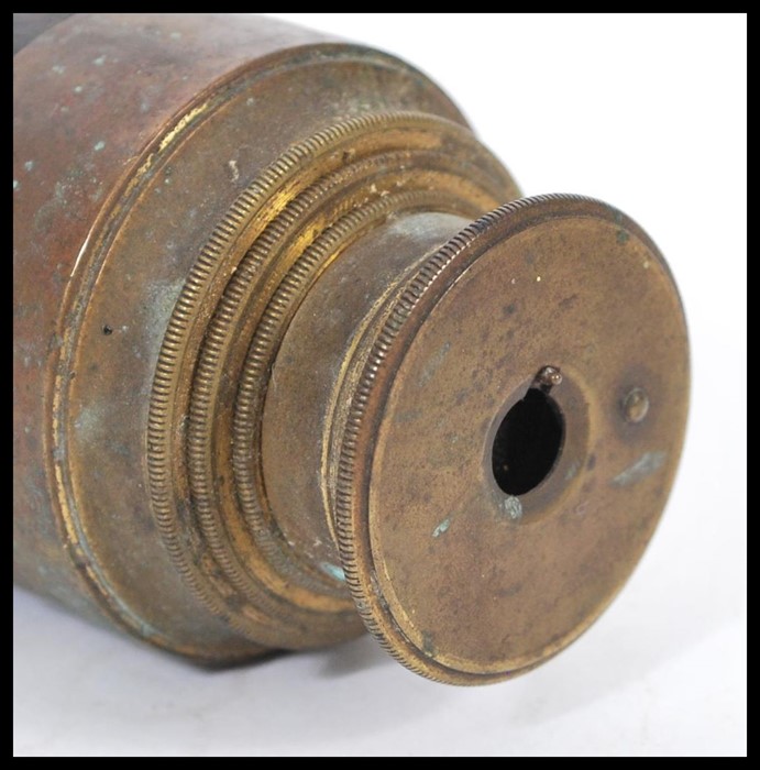 A 19th Century brass extendable telescope with a rosewood central section. - Image 3 of 6