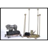 Two equestrian related cast iron items, comprising of a Horse Head boot holder - with wooden balls