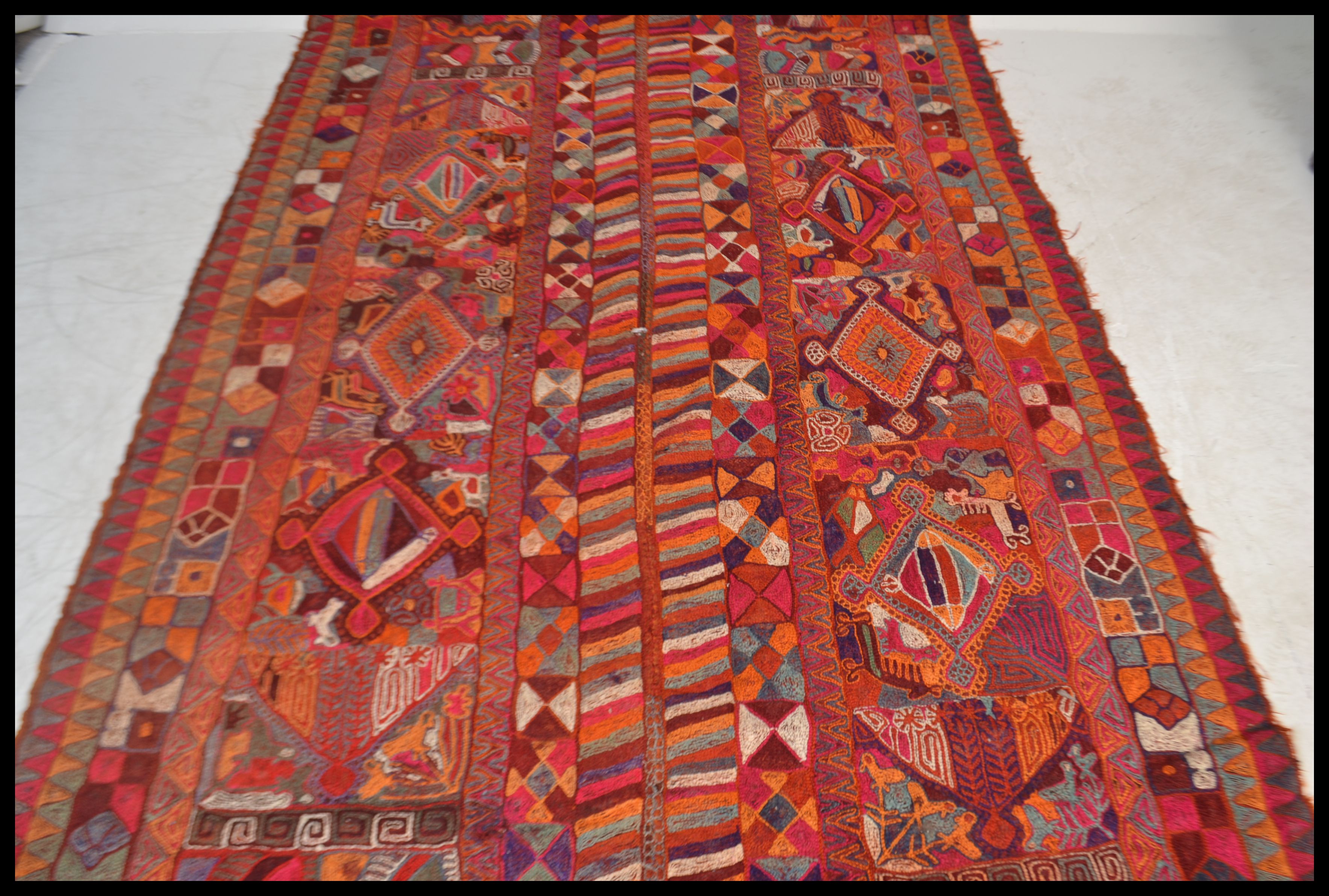A  stunning large ethnic tribal carpet rug of handwoven bright vivid form, constructed from - Image 2 of 4