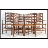A set of six early 20th Century oak ladder back dining chairs having rattan weave seats raised on