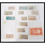 A collection of international bank notes to include Francs, Lire, Rupee, Cyprian Shillings, a 1943
