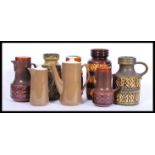 A collection of vintage retro 20th Century West German fat lava type vases along with similar