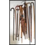 A collection of various designed walking canes dating from the late 19th / early 20th Century to