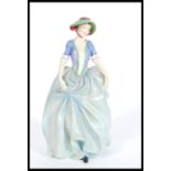 A Royal Doulton ceramic figure entitled Vanessa HN 1836, the Royal Doulton figure by L. Harradine.