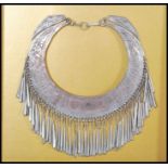 An early 20th Century Thai hill tribe ceremonial silver white metal collar necklace having