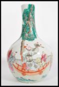 A late 19th century Chinese large baluster vase having hand painted decoration of children playing