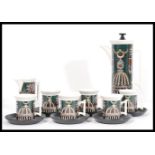 Susan William Ellis - Portmeirion - A 1960s Magic Garden pattern coffee set comprising totem