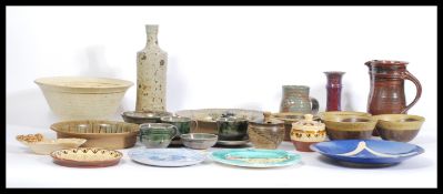 A ;large collection of vintage 20th Century studio art pottery to include various vases, bowls,