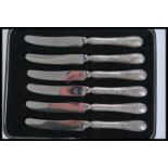 A set of six silver hallmarked handled knives complete in fitted case. Each handle bearing Sheffield