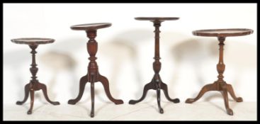 A 19th century mahogany pedestal wine table with pie crust edge together with another late 19th