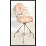 A retro vintage 20th century bedroom boudoir wire work dressing table chair having a scroll work