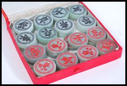 A set of thirty two Chinese jade gaming counters /