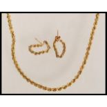 A fantastic 9ct gold rope twist necklace and earring demi parure set bearings hallmarks and being