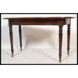 A 19th century George III mahogany d-end demi-lune console table being raised on turned legs with