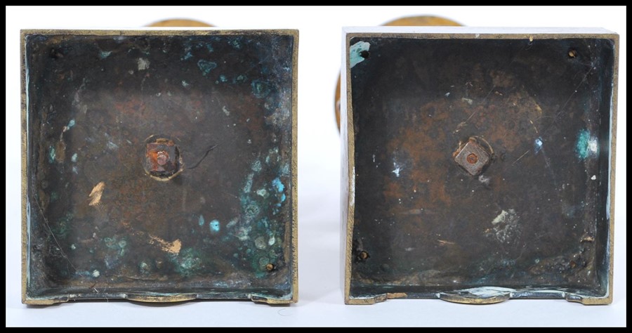 A pair of 19th century bronze urns raised on square bases with decorations of swags and ribbons with - Image 6 of 9