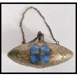 An early 2oth Century Chinese silver plated drinks flask of ovoid shape having lapis lazuli inlay.