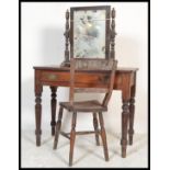 A 19th Century Victorian mahogany writing table / desk having a flared top over single drawer raised