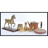 A collection of vintage brass wares to include a brass cast sculpture of a horse mounted on a