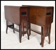 A near pair of Edwardian mahogany Sutherland table / tables being raised on squared legs with railed