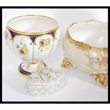 A collection of 19th century porcelain to include a pair of Sitzendorf floral embossed vases of
