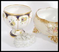 A collection of 19th century porcelain to include a pair of Sitzendorf floral embossed vases of