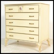 A Louis 16th style painted shabby chic bachelors chest of drawers having a bow front and raised on
