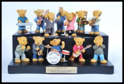 A collection of 12 x Cliff Richard Rock 'N' Roll Bearsby the Danbury Mint resin teddy bear figurines