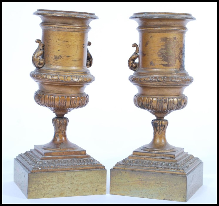A pair of 19th century bronze urns raised on square bases with decorations of swags and ribbons with - Image 5 of 9