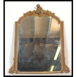 A fine Regency 19th century large overmantel mirror wood gilt plaster gesso work adorned with