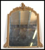 A fine Regency 19th century large overmantel mirror wood gilt plaster gesso work adorned with