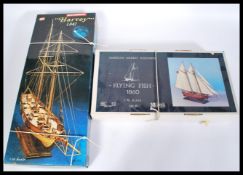Two boxed unassembled model kits of ships, the kits consisting of a Reveal American Schooner