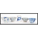 A group of 18th Century Chinese porcelain to include four tea bowls having hand painted blue and